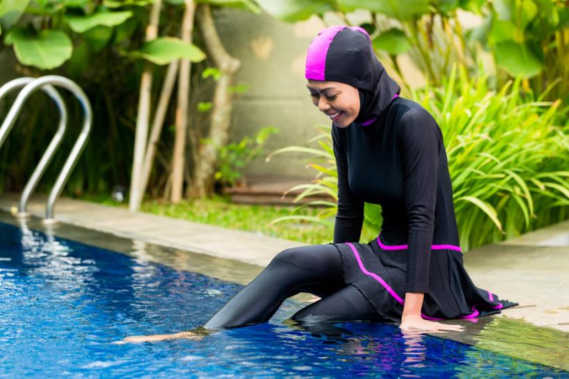 Some French towns have banned the burkini bathing suit. Image: Shutterstock.