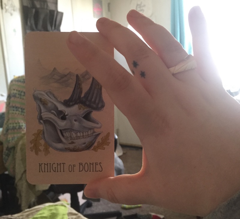 The Knight of Bones card from The Wooden Tarot deck by Skullgarden