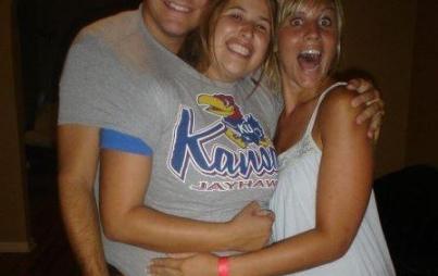 The writer, center, wearing a University of Kansas Jayhawks shirt with her friends