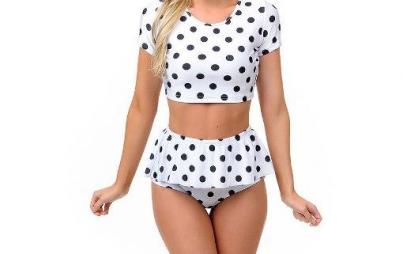 via <a href="http://www.unique-vintage.com/black-white-polka-dot-ruffled-crop-top-two-piece-swimsuit.html">Unique Vintage</a>